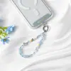 Correa creativa para teléfono móvil, colgante de bolso tejido a mano estilo ins sal marina, correa antipérdida en forma de estrella para mujer, en stock