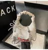 Bolsa de Mão Plissada Estilo Coreano de Nicho Nova Primavera 2026 Bolsa Dumpling para Mulheres, Bolsa de Ombro Transversal Versátil Casual