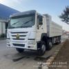 Suministros de Fábrica Camión Volquete Africano Sinotruk Howo, Camión y Camión Mezclador con Cuatro Delanteros y Ocho Traseros 12 Ruedas