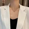Elegante Collar Sólido Nuevo de Moda en Acero de Titanio con Pequeña Bola Dorada y Cadena de Hueso de Serpiente para Mujer, Accesorio Simple y Versátil