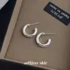 ¡Artesanía de Alta Gama! Agujas Chapadas en Plata con Acabado Pulido de 14K, Pendientes Redondos Sencillos, Pendientes Estilo Ins de Alta Gama, Suministro Mayorista de Fábrica