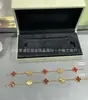 Transmissão ao vivo estilo quente V dourado versão alta pulseira de trevo de quatro folhas feminina luxo leve moda versátil banhada a ouro 18k ágata madrepérola pulseira de cinco pétalas