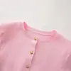 Ins estilo europeo y americano transfronterizo 2026 nueva moda elegante para ir al trabajo manga corta cuello redondo hombreras acolchadas casual chaqueta corta de punto