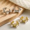 Pendientes vintage de perla chapados en oro y cobre transfronterizos de Aogu, pendientes personalizados de nicho de estilo frío INS para mujer, europeos y americanos.
