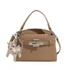 Bolsa Kelly de Mão com Padrão de Crocodilo Transfronteiriça para Mulheres Outono 2025 Nova Moda de Luxo Bolsa de Ombro Estilo Ocidental Bolsa Transversal