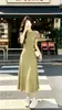 Vestido Sencillo Estilo Coreano de Verano 2026 con Pliegues Laterales, Cintura Ceñida, Mangas Cortas Adelgazantes, que Cubre las Caderas, Caída Elegante y Falda de Dobladillo Amplio