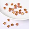 Suministro directo de fábrica mini flor de resina flor pequeña de cinco pétalos DIY manicura funda de teléfono decorativa pendientes de botón accesorios de joyería