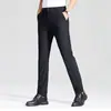 Pantalones Casuales de Negocios para Hombre Otoño/Invierno 2026 Estilo Nuevo Gruesos con Forro Polar Sueltos de Pierna Recta Pantalones Formales de Vestir Profesionales