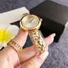 Popular en el comercio exterior, reloj de pulsera de metal con dibujos animados con pequeños puntos y marcas de color rosa claro, compacto, de nicho, simple e impermeable