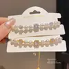 Pulsera de Perlas y Circonia Cuadrada Chapada en Oro Real de 18k Anillo de Mano de Lujo Ligero y Alta Gama Joyería de Mano Moderna y Versátil para Mujeres