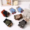 Guantes de dedo medio para niños otoño e invierno niños medio dedo cálidos lindos estudiantes de primaria escritura guantes de punto de doble propósito al por mayor