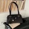 Coleção de outono 2026 transfronteiriça: bolsa tote requintada, de grande capacidade, estilo nicho para o trajeto diário, bolsa de ombro fashion