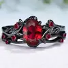 Anillo de pareja cruzado Sanjie de comercio transfronterizo europeo y americano retro de moda, anillo de rubí, ramas de rosa negra, par cruzado