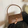 Bolsa de ombro estilo baguette de alta qualidade para mulheres, novo modelo outono 2026, bolsa de ombro super popular com estampa de leopardo estilosa, bolsa de mão moderna e elegante
