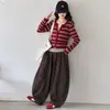 Nueva colección de otoño para niñas: Top de punto a rayas estilo coreano con diseño de dos piezas falsas, combinado con pantalones de algodón de pierna curva - un atuendo moderno para niños mayores