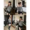 Top de punto coreano para mujer de otoño e invierno, de un solo hombro, a rayas, manga larga, ajustado, sin hombros