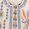 Ins estilo europeo y americano transfronterizo 2026 nueva moda elegante para mujer al por mayor para ir al trabajo cuello redondo holgado chaleco top bordado