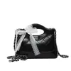 Bolsa feminina de comércio exterior de alta qualidade, modelo novo 2026, com padrão de diamante, elegante e versátil, bolsa pequena de ombro e transversal com design de nicho
