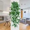 Colgante de pared de planta verde artificial Amazon transfronterizo decoración del hogar planta verde falsa pothos adorno de hoja de vid planta artificial