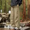 Pantalones de trabajo casuales estilo americano con múltiples bolsillos para hombre, de corte holgado moderno, tallas grandes, versátiles, de pierna recta, adecuados para primavera y otoño