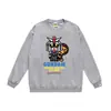 Marca moderna de estilo japonês com estampa de desenho animado de cabeça de macaco, nova blusa de moletom casual de gola redonda em terry de corte solto para homens e mulheres, adequada para adolescentes no outono e inverno