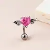 Europa y Estados Unidos venta caliente joyería para perforación corporal hebilla de ombligo incrustada con corazón de circón alas forma de corazón clavo de ombligo anillo de ombligo de nicho de moda