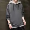 Stock de fábrica: Sudadera con capucha para hombre, manga larga, color liso, estilo retro, adecuada para primavera, otoño e invierno, negra, producto de comercio electrónico transfronterizo