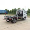 Caminhão de Lixo Dongfeng com Braço de Gancho Quadrado Pode Ser Usado para Coletar e Transportar Lixo Doméstico em Áreas Residenciais, Pontos Turísticos e Áreas Rurais. Um Caminhão Pode Carregar Múltiplos Contêineres