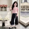Verão para Crianças Grandes Nova Camiseta Manga Curta Estilo Coreano para Meninas Conjunto de Duas Peças Elegante com Calça de Perna Larga e Patchwork Xadrez Casual Tendência