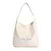 Bolsa Tote de Gran Capacidad para Mujer, Estilo Nuevo para Compras y Viajes, Bolso de Hombro Versátil, Bolsa de Nicho para el Trabajo y los Viajes Diarios para Mujer