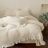 Nuevo Juego de Cuatro Piezas de Leche Tejida Tallada Romántica Francesa 2026 - Canción de Amor de Invierno Juego de Cuatro Piezas con Sábana Plana de 1.8m