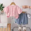 Ropa para Niñas Exportación Linda Estampado de Letras Colorido Cuello Redondo 2026 Encaje Perla Moño Manga Corta Nuevo Verano Conjunto de Dos Piezas
