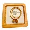 Pulseira de madeira de pêssego com nó de bambu para homens e mulheres, simbolizando progresso contínuo e boa sorte, com caroço de pêssego, caractere da fortuna e receptáculo de lótus, em um novo estilo chinês