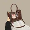 Bolsa Saco Feminina 2026 Novo Estilo Verão Ombro Transversal Melard Moda Retrô Bolsa de Mão