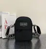 Jielanshi 2026 Primavera Nova Bolsa Esportiva com Bloqueio de Cores em Tecido Impermeável Bolsa de Ombro Unissex Bolsa Transversal Bolsa para Celular Versátil