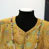 Abrigo de otoño de alta gama para madres, nuevo estilo primavera y otoño 2026, ropa para mujeres de mediana edad de 50 años, top de moda de lujo ligero estilo chino