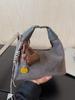 Bolsa de Mão com Design Retrô de Nicho Moda Feminina Nova Versátil Bolsa de Axila Bolsa de Ombro Único Transversal Popular de Alto Padrão