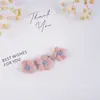 Jiangsu Yancheng Dafeng Ximing Fabricante de Accesorios para Ropa Flores Pequeñas Hechas a Mano Flores de Tela Pequeñas Rellenas de Algodón Estéreo
