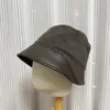 Sombrero de pescador de retazos de lana con ala de cuero PU estilo vintage para mujer, versión coreana, liso retro, de nicho, único, sensación de alta gama