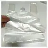 Bolsas para alimentos cocidos empaque a granel transparentes comerciales con asas bolsillos de plástico bolsas de mano blancas comerciales bolsas de plástico