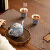 Tetera taza de té de cerámica de alta calidad azul plateado y oro blanco y plata belleza equivocada para el hogar una olla dos tazas juego de té kung fu caja de regalo