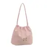 Bolsa de Ombro Estilosa de Alto Acabamento Estilo Coreano Nova Moda Primavera 2026 Bolsa Saco com Cordão de Laço de Grande Capacidade para Mulheres