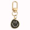 Colgante de Carita Sonriente Linda Más Vendido de Amazon Aleación de Zinc Colgante para Bolsa de Coche Color Caramelo Llavero Versátil de Carita Sonriente