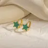 Pendientes geométricos huecos de estrella europeos y americanos, nicho retro, diseño versátil de moda transfronteriza, ear cuffs de círculo geométrico para mujer