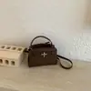 Diseño de Nicho Bolso Kelly Bolso de Mano para Mujer Bolso Cruzado Primavera 2026 Bolso Cuadrado Pequeño para Commuter Estilo Coreano Moda Ins Bolso de Hombro
