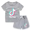 2023 Verão Infantil Gola Redonda Camiseta Calças Quentes Coreano Casual Base Camisa Suor-absorvente Doce Conjunto de Camiseta Infantil