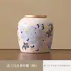 Lata de Té Cerámica Lily para el Hogar Sellada a Prueba de Humedad Pequeño Almacén de Té Portátil para Viaje Lata de Almacenamiento Compañero Regalo