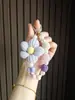 Bolso de amor de flor de lana hecho a mano corto adornos de cuentas ins Moda Rojo de internet cordón para teléfono móvil cadena portátil cordón