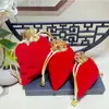 Venta Directa de Fábrica Bolsas de Felpa Corta con Cordón en Blanco para Almacenamiento de Joyería y Accesorios Pequeños, Color Rojo