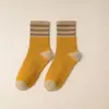 Nuevos Calcetines de Otoño e Invierno para Hombres y Mujeres Calcetines Gruesos Cálidos con Forro de Felpa Japonés calcetines de toalla de piso de tres rayas de rizo calcetines de tubo medio